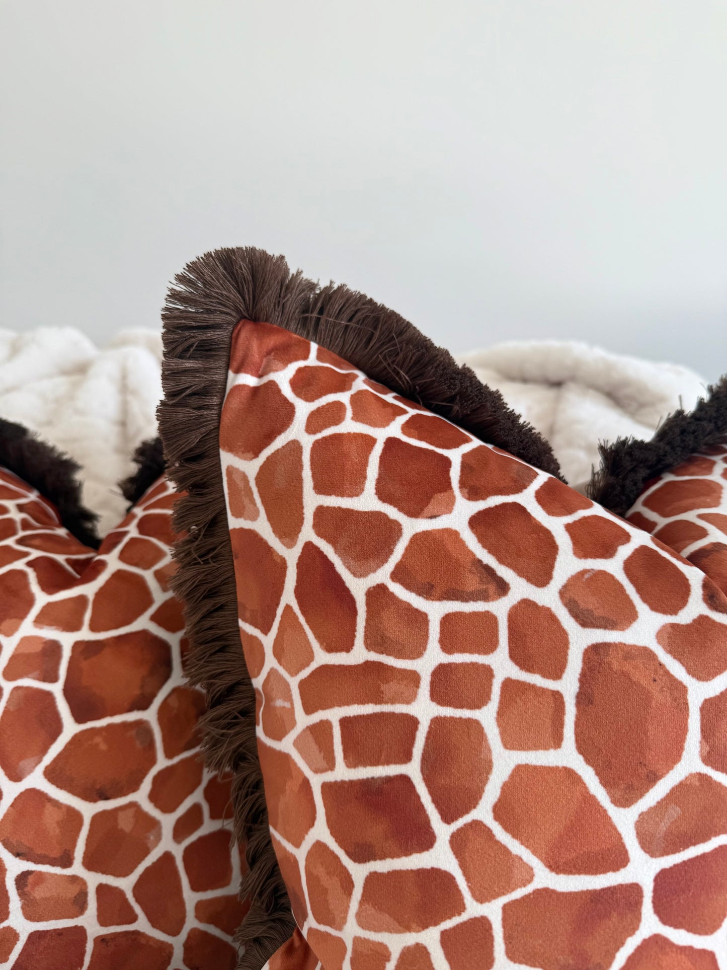 Rust Orange Giraffe Print Cushion with Fringe Trim