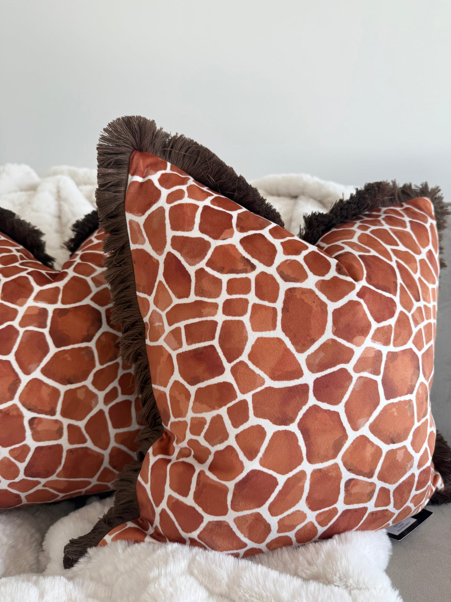 Rust Orange Giraffe Print Cushion with Fringe Trim