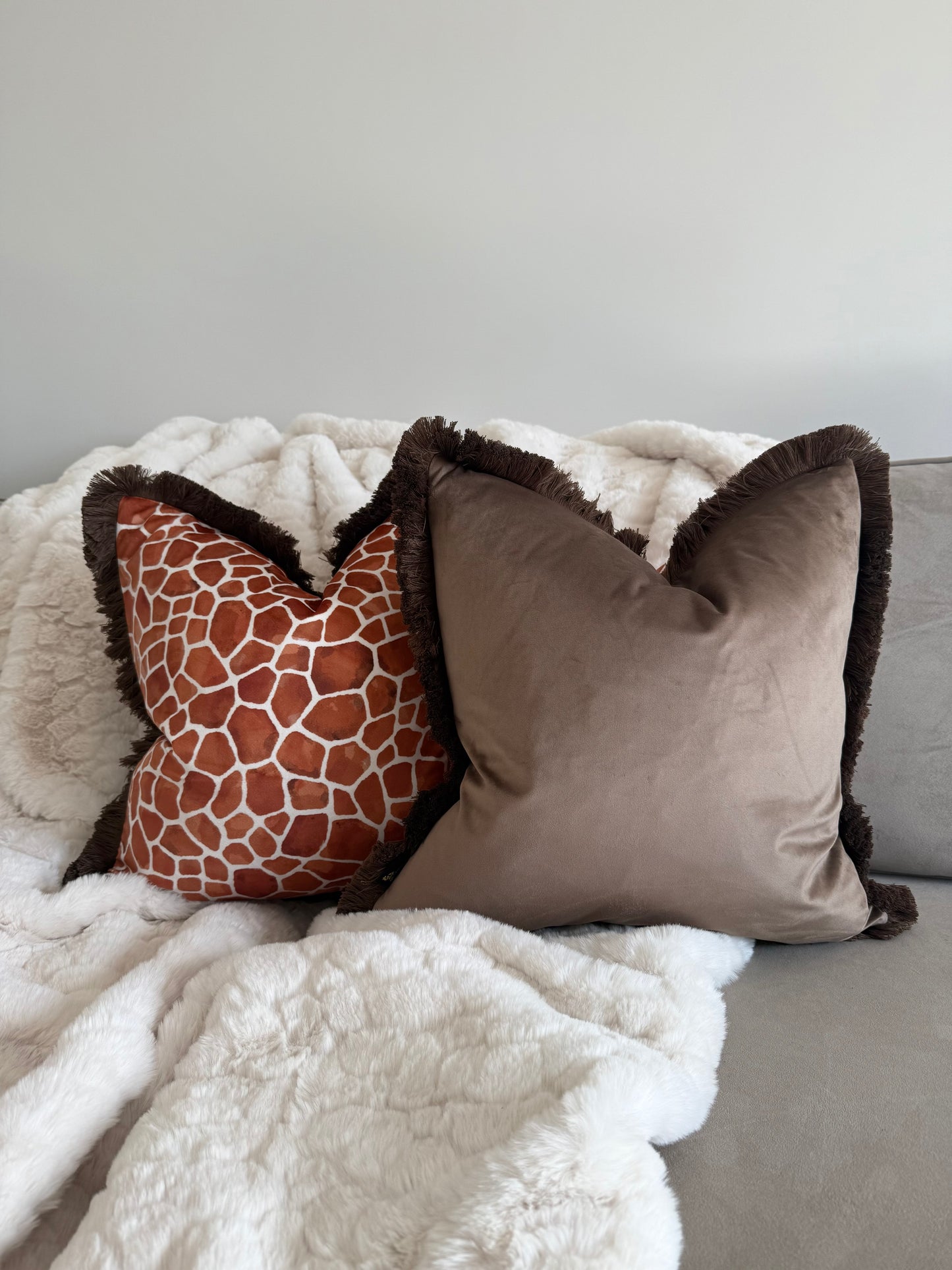 Rust Orange Giraffe Print Cushion with Fringe Trim