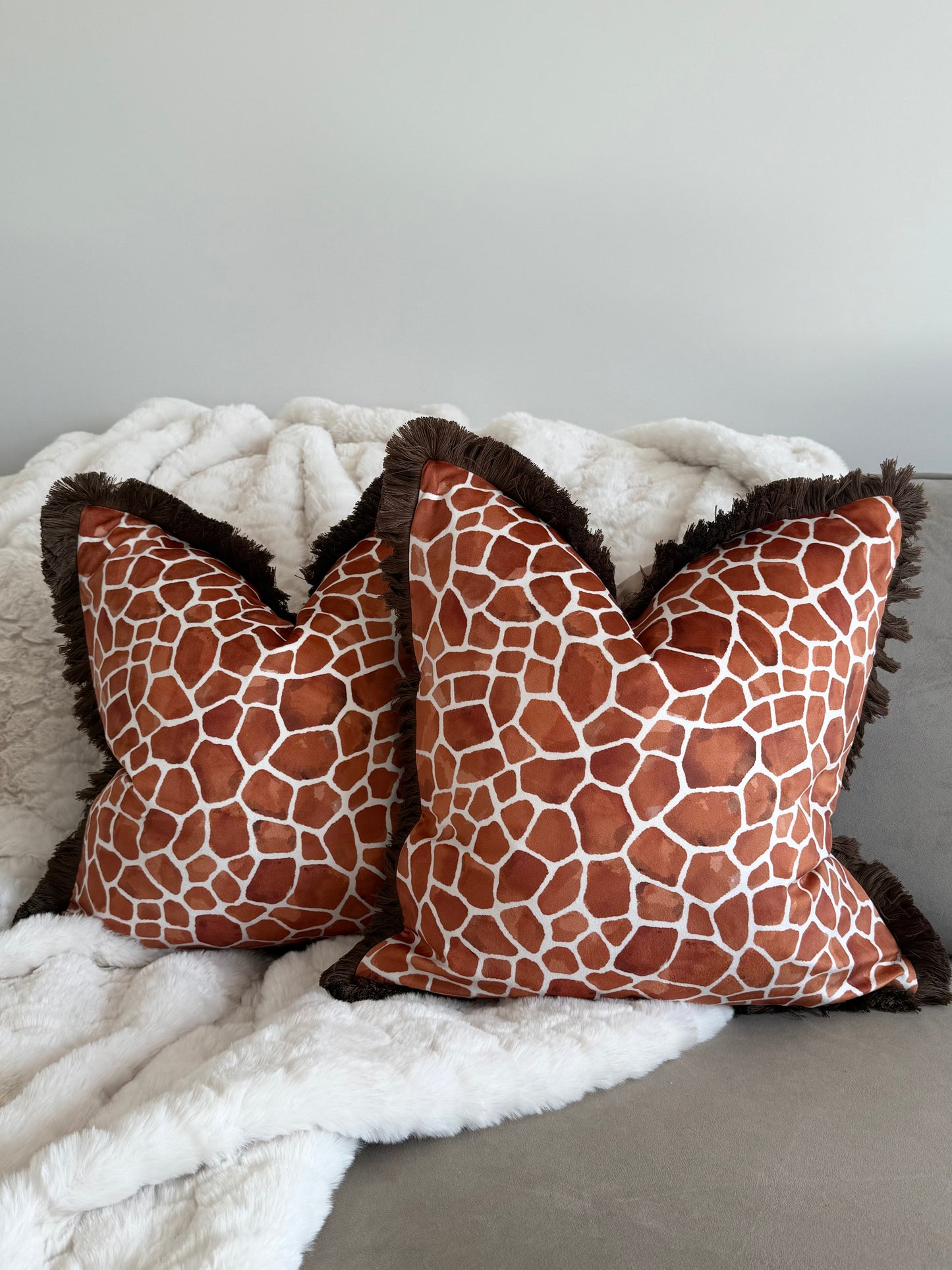 Rust Orange Giraffe Print Cushion with Fringe Trim