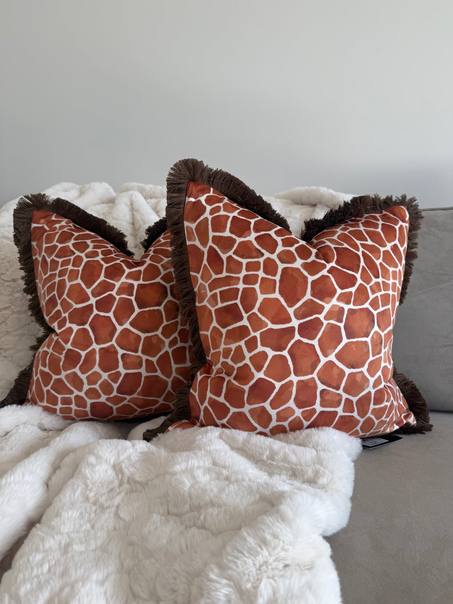 Rust Orange Giraffe Print Cushion with Fringe Trim